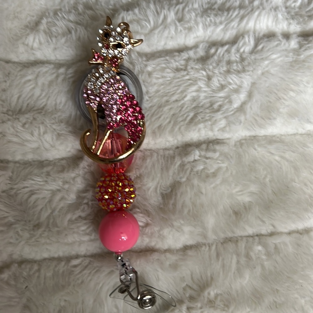 Pink rhinestone Cat badge reel